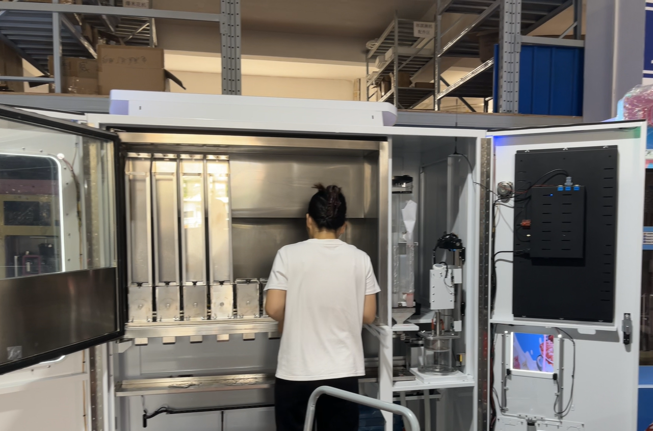 YumBoxs smoothie vending machine open for factory inspection