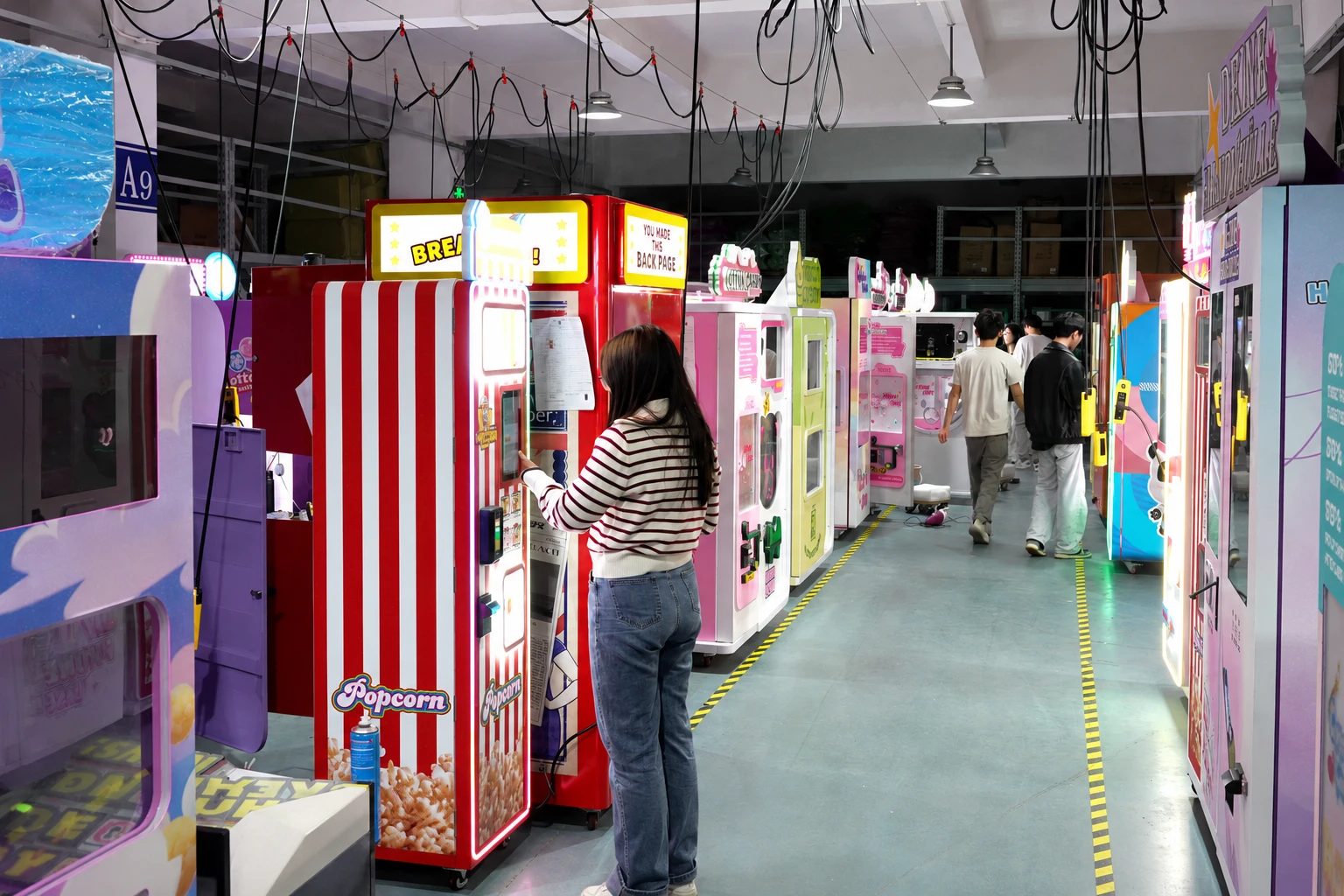YumBoxs technician testing vending machine electrical components
