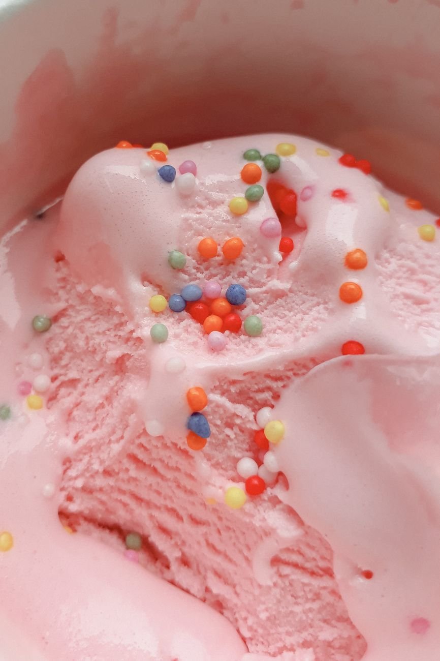 pink ice cream with sprinkles
